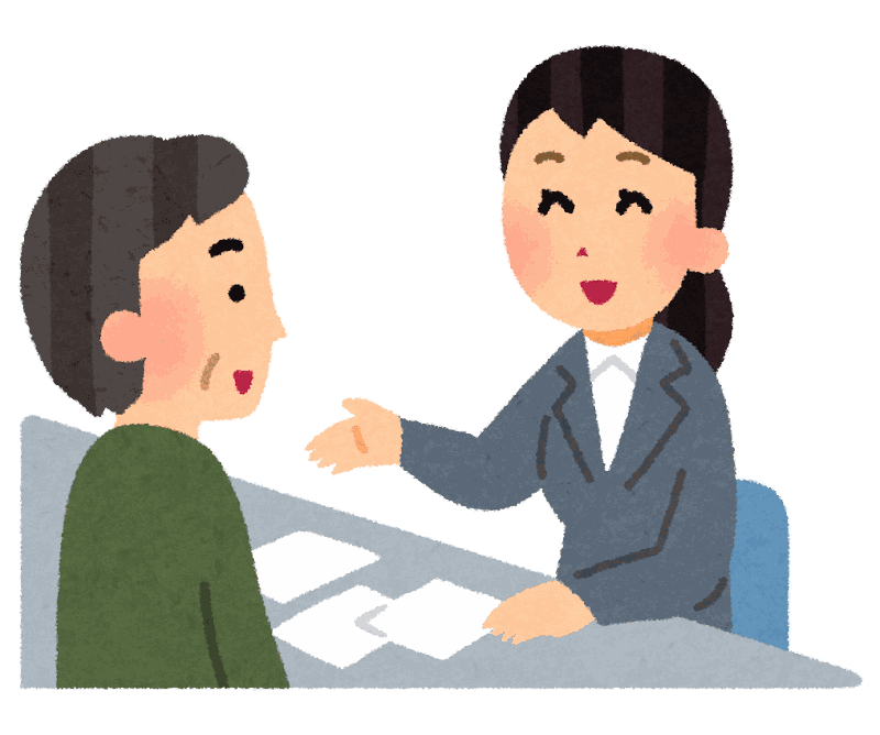役所の窓口で職員に相談している様子のイラスト